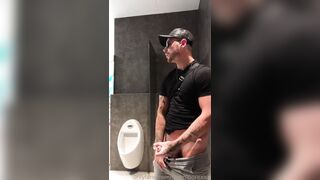 Busting my nut out in the open in a public bathroom in Madrid