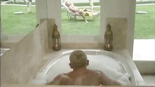 Muscular gay daddy and his twink fuck in the tub