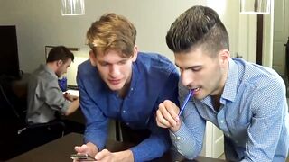 Three young businessmen have a breeding session in the office 